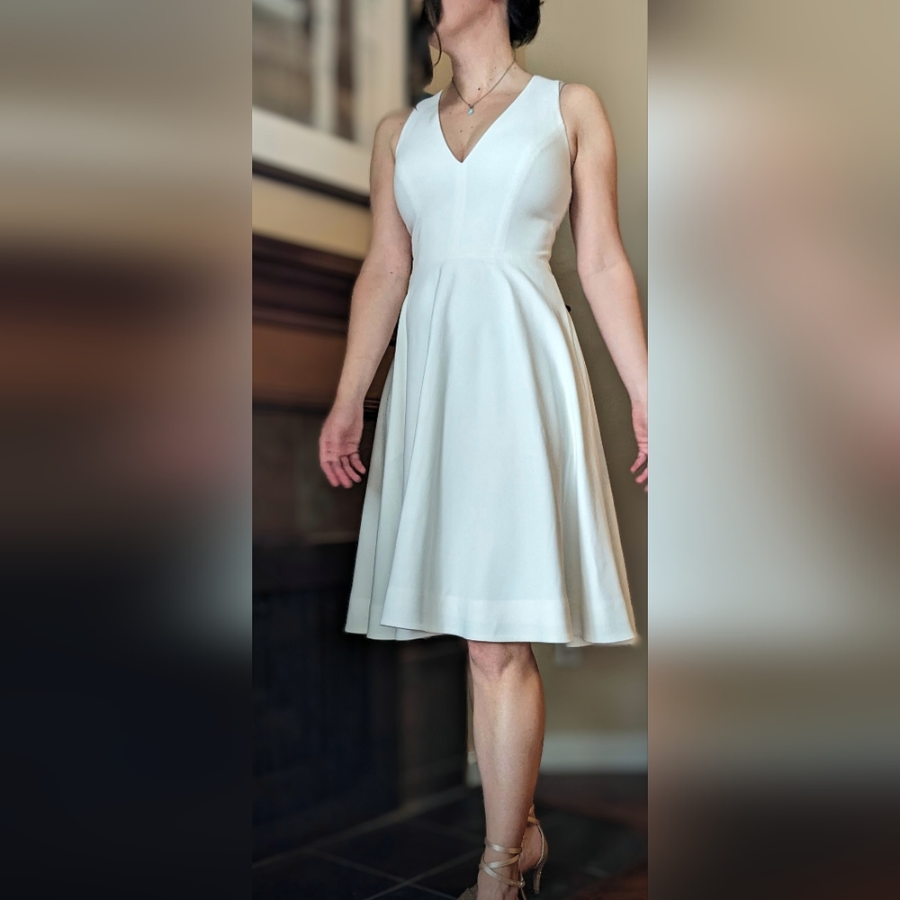 Size 8 Dress the Population white V-neck dress